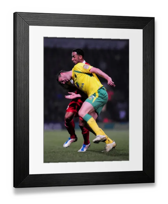 Framed Print : Nicky Maynard vs. Elliott Ward: Battle for the Ball in Norwich City vs. Bristol City Championship Clash (14 / 03 / 2011) Framed Print : Nicky Maynard vs. Elliott Ward: Battle for the Ball in Norwich City vs. Bristol City Championship Clash (14 / 03 / 2011)