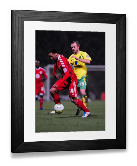 Framed Print : Nicky Maynard vs. David Fox: Battle for Supremacy in the Championship Clash between Norwich City and Bristol City - 14 / 03 / 2011 Framed Print : Nicky Maynard vs. David Fox: Battle for Supremacy in the Championship Clash between Norwich City and Bristol City - 14 / 03 / 2011