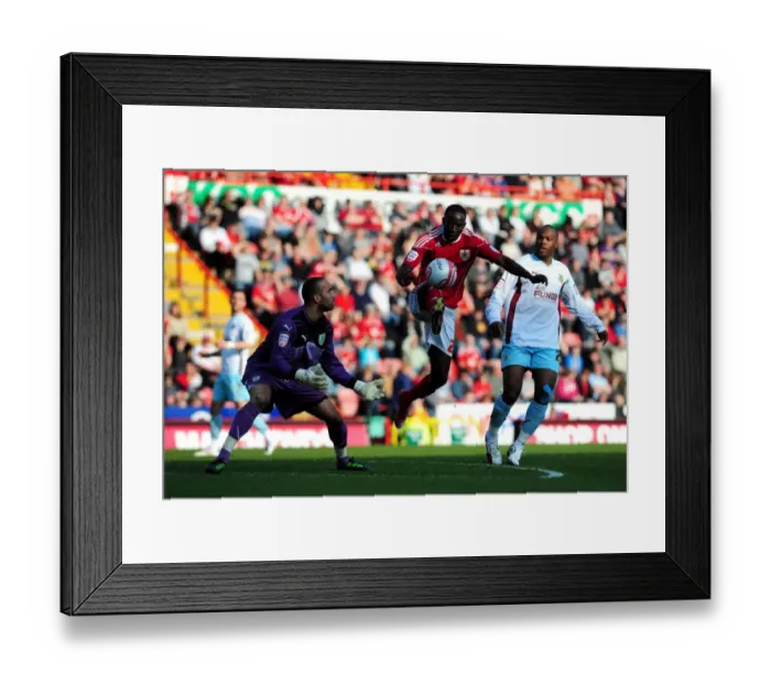 Framed Print : Adomah Outmaneuvers Grant: A Pivotal Moment in the 2011 Championship Clash Between Bristol City and Burnley Framed Print : Adomah Outmaneuvers Grant: A Pivotal Moment in the 2011 Championship Clash Between Bristol City and Burnley