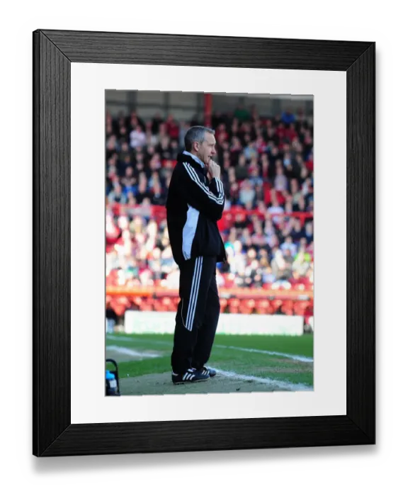 Framed Print : Bristol City vs Burnley, 19-3-2011: Keith Milen Leads the Charge in Championship Football at Ashton Gate