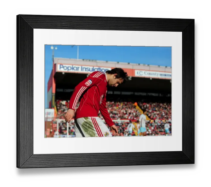 Framed Print : Brett Pitman in Action: Championship Clash between Bristol City and Burnley (19-03-2011) Framed Print : Brett Pitman in Action: Championship Clash between Bristol City and Burnley (19-03-2011)