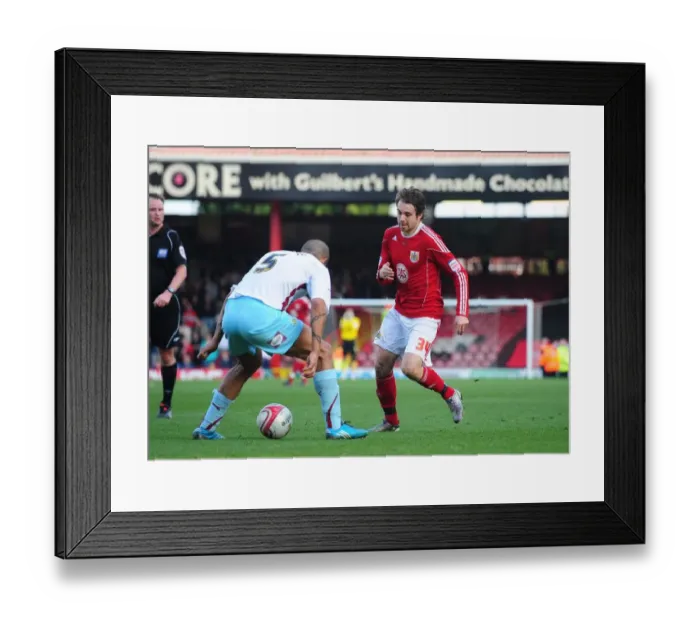 Framed Print : Brett Pitman Scores Past Clarke Carlisle in Bristol City vs Burnley Championship Clash (19-03-2011) Framed Print : Brett Pitman Scores Past Clarke Carlisle in Bristol City vs Burnley Championship Clash (19-03-2011)