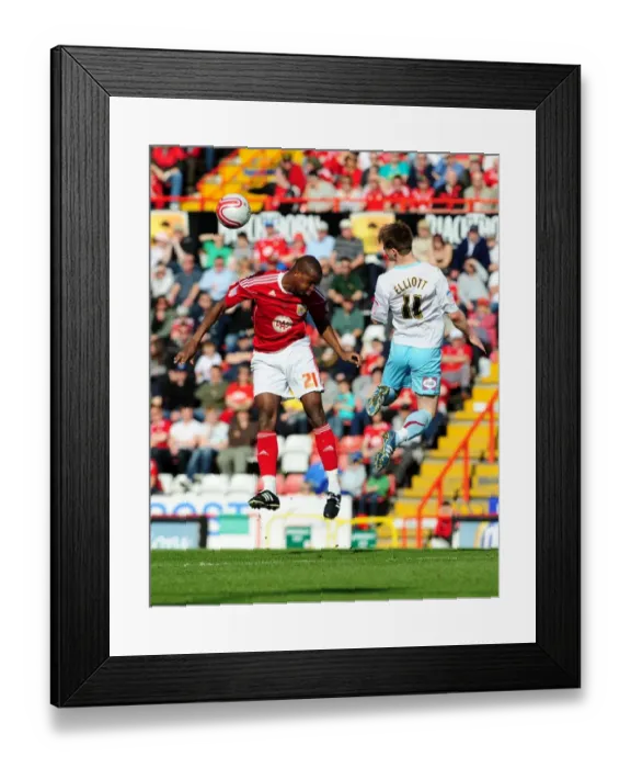 Framed Print : Battling for Supremacy: Wade Elliott vs. Kalifa Cisse in the 2011 Championship Clash between Bristol City and Burnley Framed Print : Battling for Supremacy: Wade Elliott vs. Kalifa Cisse in the 2011 Championship Clash between Bristol City and Burnley