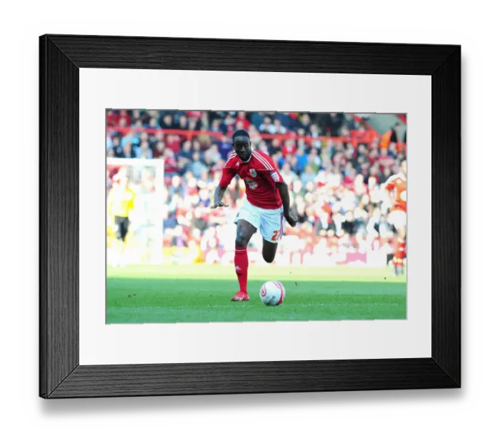 Framed Print : Adomah in Action: Championship Showdown - Bristol City vs Burnley (19 / 03 / 2011) Framed Print : Adomah in Action: Championship Showdown - Bristol City vs Burnley (19 / 03 / 2011)