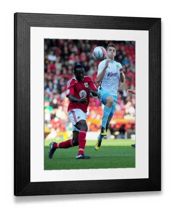 Framed Print : Battling for Championship Supremacy: Wade Elliott vs. Damion Stewart - Bristol City vs. Burnley (2011)