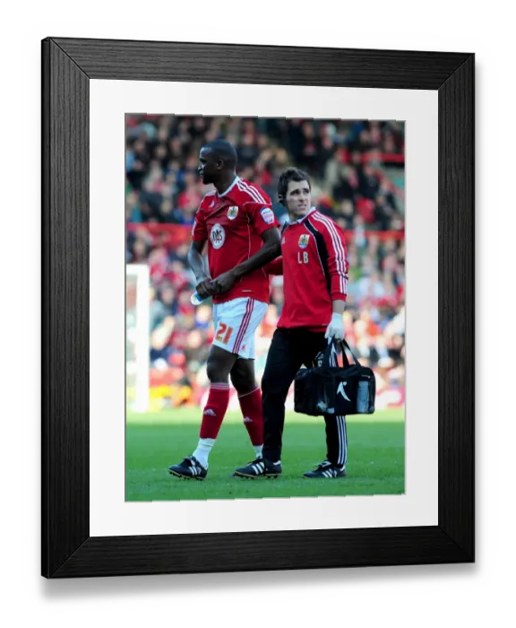 Framed Print : Bristol City's Kalifa Cisse Suffers Injury Exit vs Burnley, Championship 2011