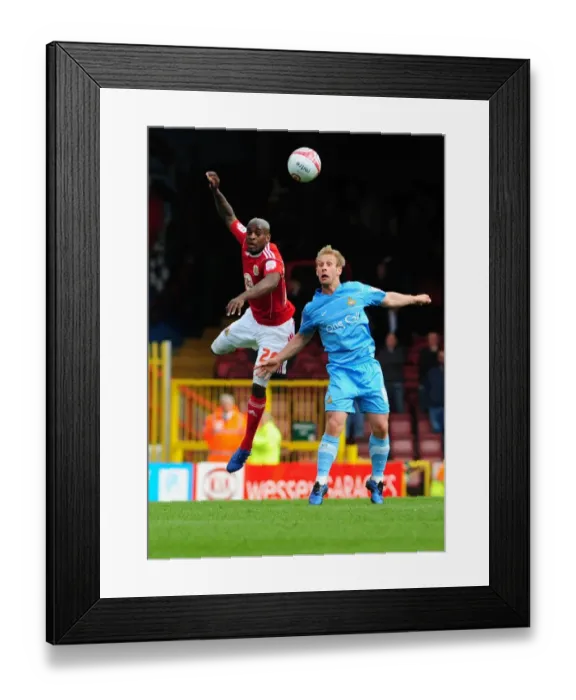 Framed Print : Battling for Supremacy: Jamal Campbell-Ryce vs. James Hayter in the Championship Clash between Bristol City and Doncaster Rovers (02.04.2011) Framed Print : Battling for Supremacy: Jamal Campbell-Ryce vs. James Hayter in the Championship Clash between Bristol City and Doncaster Rovers (02.04.2011)