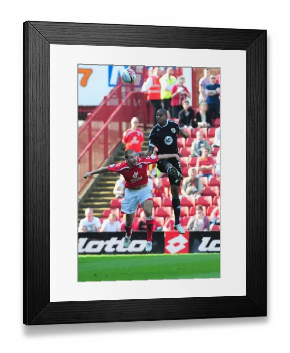 Framed Print : Marvin Elliott Wins the High Ball: Barnsley vs. Bristol City, Championship Match, April 9, 2011 Framed Print : Marvin Elliott Wins the High Ball: Barnsley vs. Bristol City, Championship Match, April 9, 2011