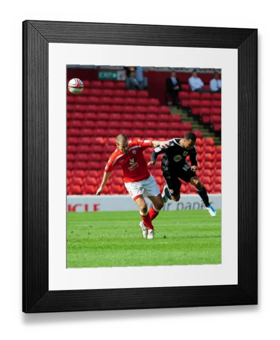 Framed Print : Barnsley vs. Bristol City: Nicky Maynard Fouled by Stephen Foster - Championship Football Match, April 9, 2011