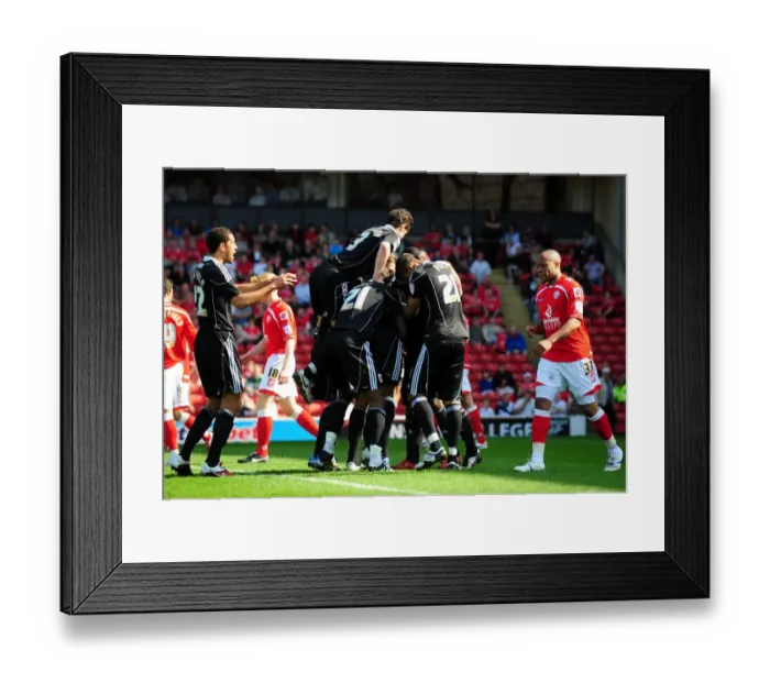 Framed Print : Marvin Elliott Scores the Thrilling Opener: Championship Clash at Oakwell Stadium (Barnsley vs. Bristol City, 09 / 04 / 2011)
