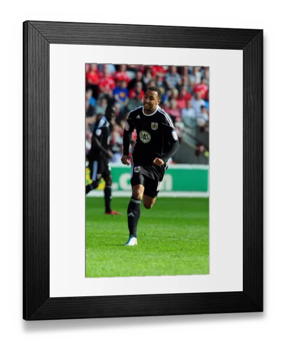 Framed Print : Nicky Maynard Strikes for Bristol City: Championship Clash against Barnsley at Oakwell Stadium (09 / 04 / 2011)