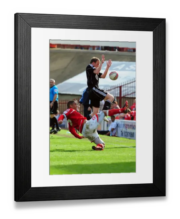 Framed Print : Battling for Supremacy: Doyle vs. Clarkson in the Championship Clash between Barnsley and Bristol City Framed Print : Battling for Supremacy: Doyle vs. Clarkson in the Championship Clash between Barnsley and Bristol City