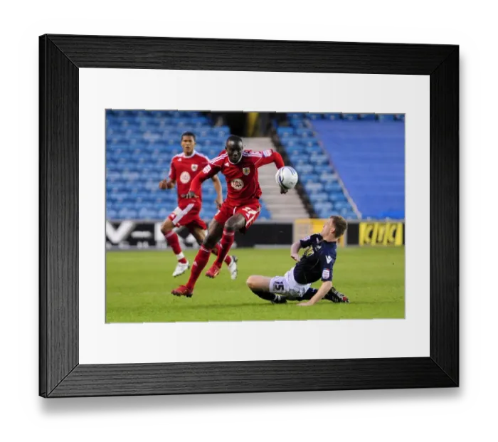 Framed Print : Albert Adomah's Evasive Move: Millwall vs. Bristol City Championship Clash (12-04-2011) Framed Print : Albert Adomah's Evasive Move: Millwall vs. Bristol City Championship Clash (12-04-2011)