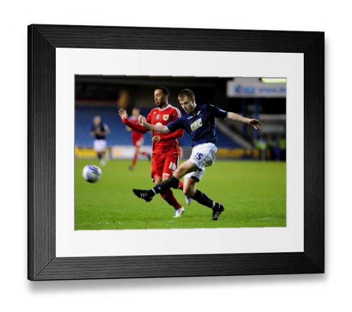 Framed Print : Nicky Maynard vs. Tony Craig: Championship Clash at The Den - Millwall vs. Bristol City (12 / 04 / 2011)