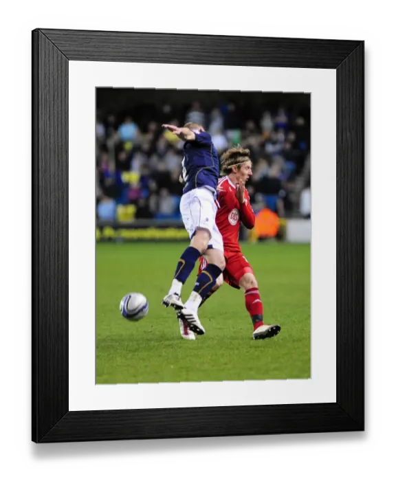 Framed Print : Battling for Supremacy: Woolford vs. Dunne in the Championship Clash between Millwall and Bristol City Framed Print : Battling for Supremacy: Woolford vs. Dunne in the Championship Clash between Millwall and Bristol City