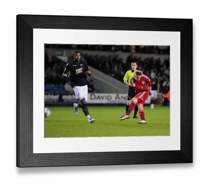 Framed Print : Bristol City's Woolford Thwarts by Millwall Keeper - Championship Clash, April 2011 Framed Print : Bristol City's Woolford Thwarts by Millwall Keeper - Championship Clash, April 2011