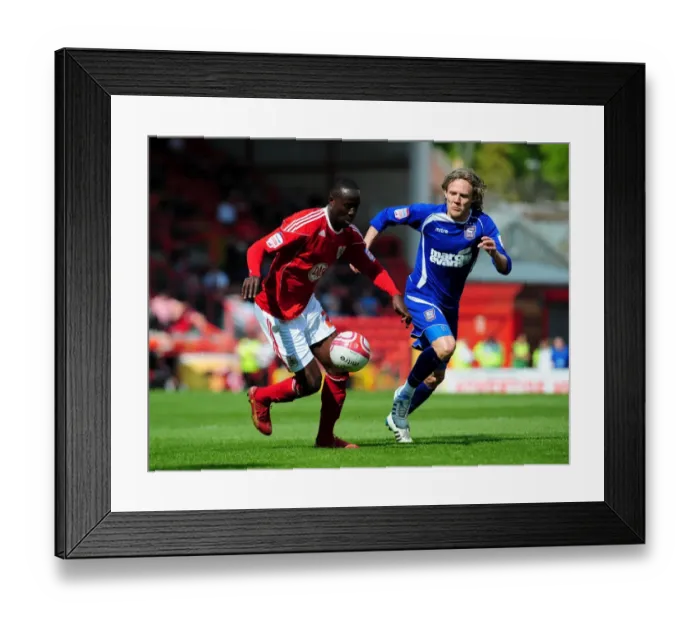 Framed Print : Adomah vs Bullard: Intense Battle for Control in the Championship Clash between Bristol City and Ipswich Town (16-04-2011) Framed Print : Adomah vs Bullard: Intense Battle for Control in the Championship Clash between Bristol City and Ipswich Town (16-04-2011)