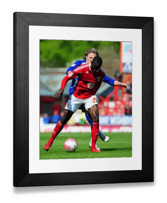 Framed Print : Intense Championship Showdown: Adomah vs. Bullard's Battle for Ball Possession (16-04-2011)