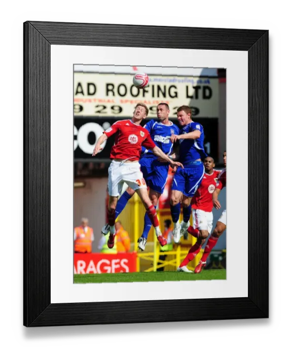 Framed Print : Bristol City vs Ipswich Town: Jon Stead's Aerial Battle in the Championship (16-04-2011) Framed Print : Bristol City vs Ipswich Town: Jon Stead's Aerial Battle in the Championship (16-04-2011)