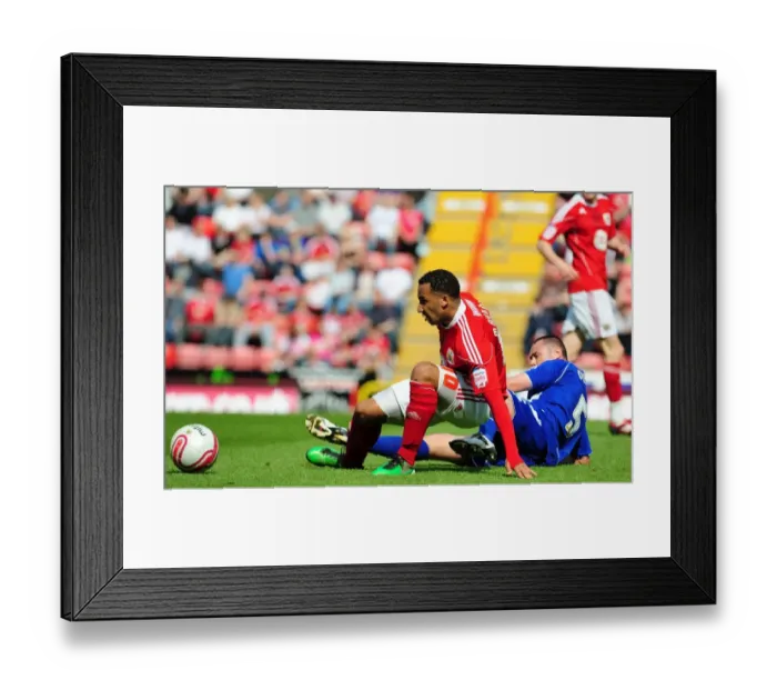 Framed Print : Bristol City's Nicky Maynard Foul by Ipswich's Damien Delaney in Championship Match, April 2011
