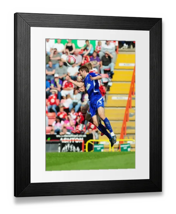 Framed Print : Battling for Supremacy: McAuley vs. Stead in the Championship Clash between Bristol City and Ipswich Town (16-04-2011)