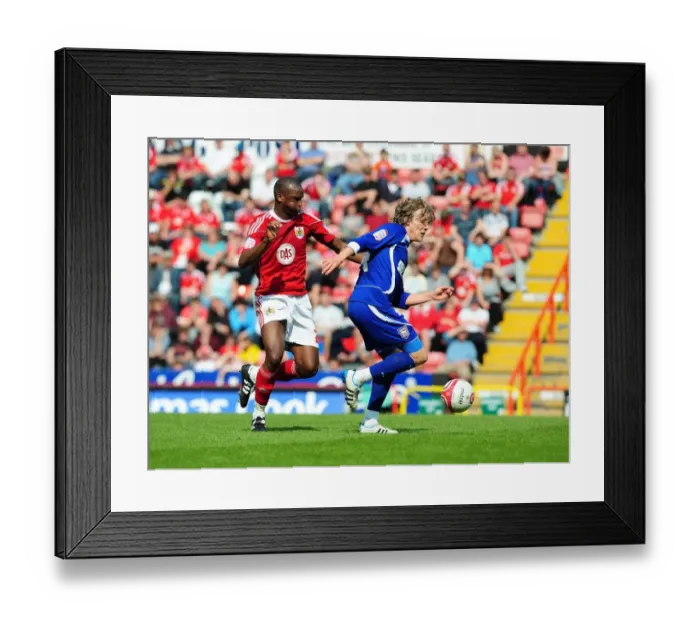 Framed Print : Intense Rivalry: Cisse vs Bullard Clash in the Championship Battle between Bristol City and Ipswich Town, April 2011 Framed Print : Intense Rivalry: Cisse vs Bullard Clash in the Championship Battle between Bristol City and Ipswich Town, April 2011