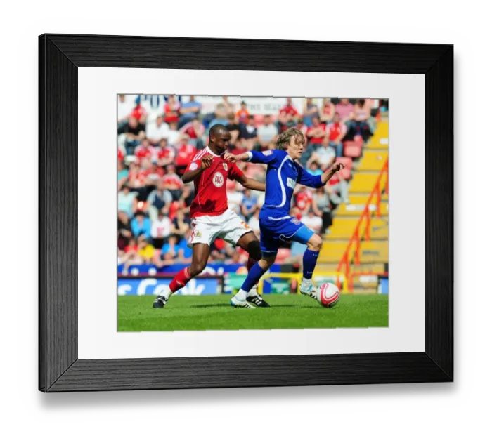 Framed Print : Intense Rivalry: Cisse vs. Bullard - Championship Showdown: Bristol City vs. Ipswich Town, April 2011 - A Battle for Supremacy Framed Print : Intense Rivalry: Cisse vs. Bullard - Championship Showdown: Bristol City vs. Ipswich Town, April 2011 - A Battle for Supremacy