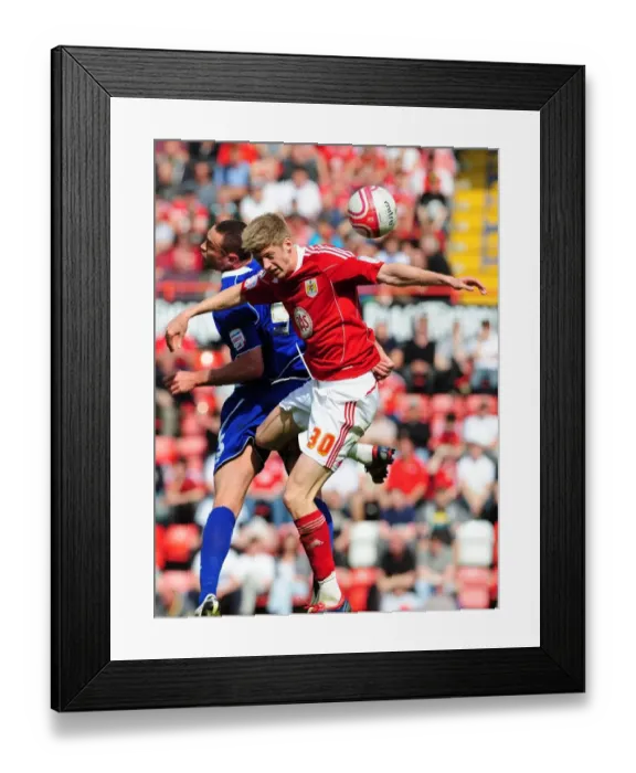 Framed Print : Bristol City vs Ipswich Town: Jon Stead vs Damien Delaney's Aerial Battle in Championship Football, April 2011 Framed Print : Bristol City vs Ipswich Town: Jon Stead vs Damien Delaney's Aerial Battle in Championship Football, April 2011