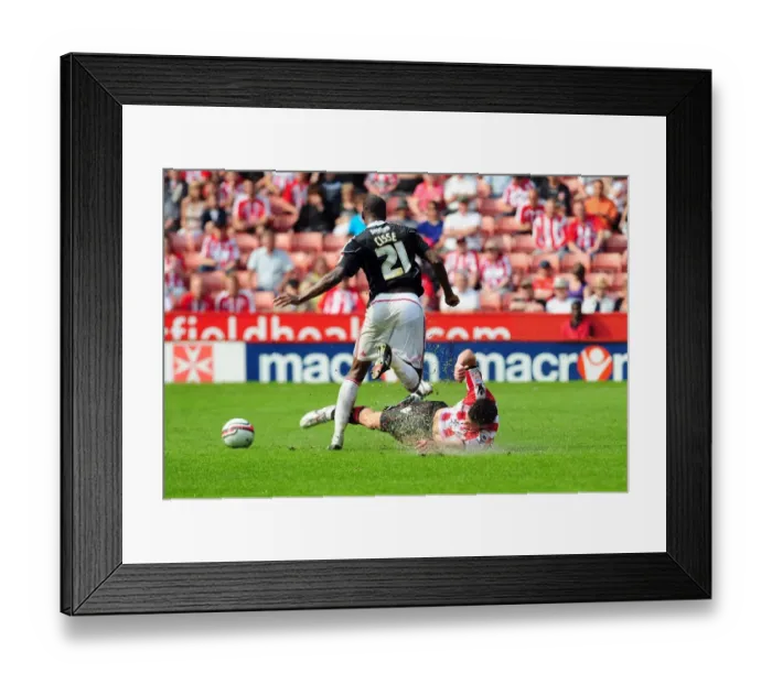 Framed Print : Clash of Titans: Lowry vs. Cisse - Sheffield United vs. Bristol City Championship Showdown, 23rd April 2011: A Football Rivalry Unfolds at Bramall Lane Framed Print : Clash of Titans: Lowry vs. Cisse - Sheffield United vs. Bristol City Championship Showdown, 23rd April 2011: A Football Rivalry Unfolds at Bramall Lane