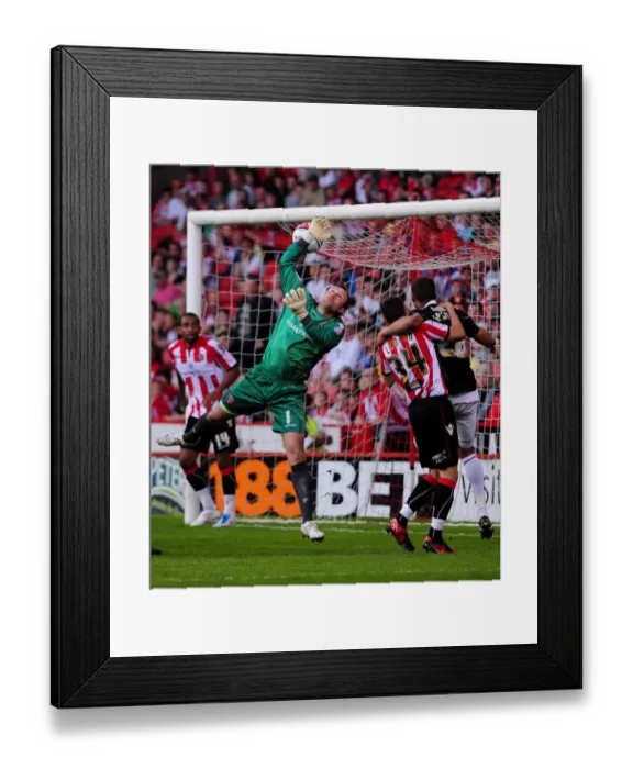 Framed Print : Bristol City's Brett Pitman Scores Own Goal Against Sheffield United's Steve Simonsen - Championship Match, 23rd April 2011 Framed Print : Bristol City's Brett Pitman Scores Own Goal Against Sheffield United's Steve Simonsen - Championship Match, 23rd April 2011