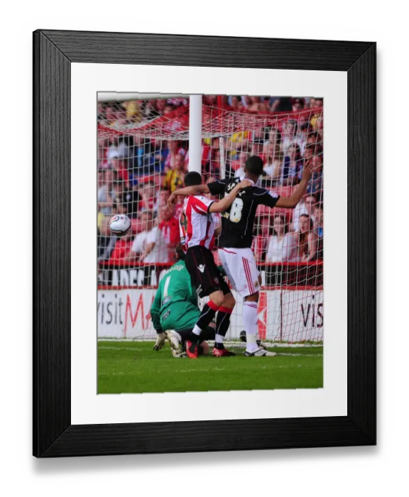 Framed Print : Bristol City's Brett Pitman: Unintended Goal Leads to Own Goal by Sheffield United's Steve Simonsen (23rd April 2011, Championship) Framed Print : Bristol City's Brett Pitman: Unintended Goal Leads to Own Goal by Sheffield United's Steve Simonsen (23rd April 2011, Championship)