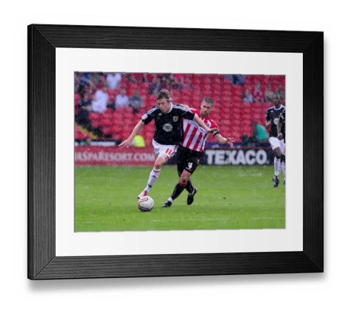 Framed Print : Battling for Supremacy: Woolford vs. Montgomery in the Championship Clash between Sheffield United and Bristol City (April 2011) Framed Print : Battling for Supremacy: Woolford vs. Montgomery in the Championship Clash between Sheffield United and Bristol City (April 2011)