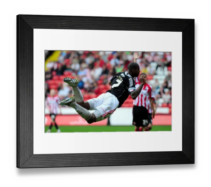 Framed Print : Marvin Elliott Leaps for Glory: A Championship Clash between Sheffield United and Bristol City, 23rd April 2011