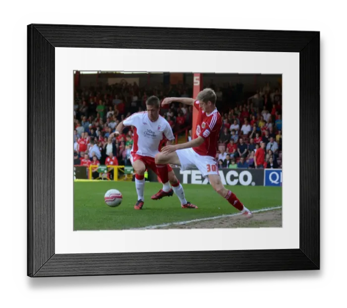 Framed Print : Championship Showdown: A Battle for Possession - Jon Stead vs. Luke Chambers, Bristol City vs. Nottingham Forest (April 2011) Framed Print : Championship Showdown: A Battle for Possession - Jon Stead vs. Luke Chambers, Bristol City vs. Nottingham Forest (April 2011)