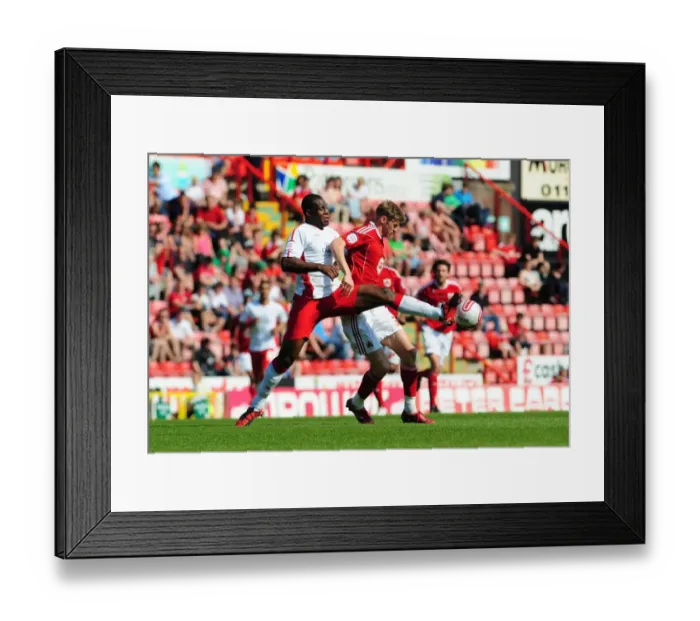 Framed Print : Bristol City vs Nottingham Forest: 2010-11 Season Showdown - A Football Rivalry Unfolds