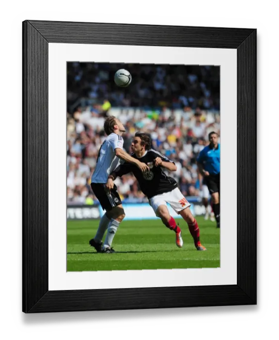 Framed Print : Battling for Supremacy: Pitman vs. Anderson in the Derby County vs. Bristol City Championship Clash, April 2011