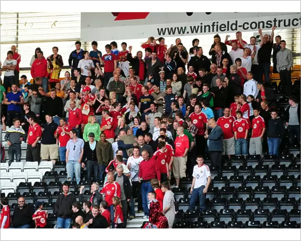 Thrilling Championship Victory: Euphoric Bristol City Fans Celebrate at Derby County's Pride Park (April 30, 2011)