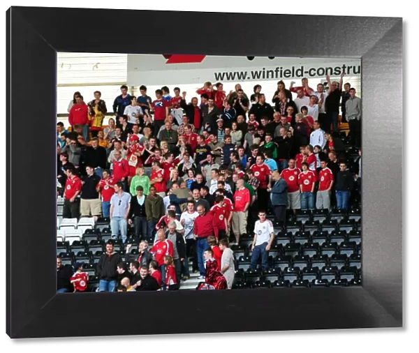 Thrilling Championship Victory: Euphoric Bristol City Fans Celebrate at Derby County's Pride Park (April 30, 2011)