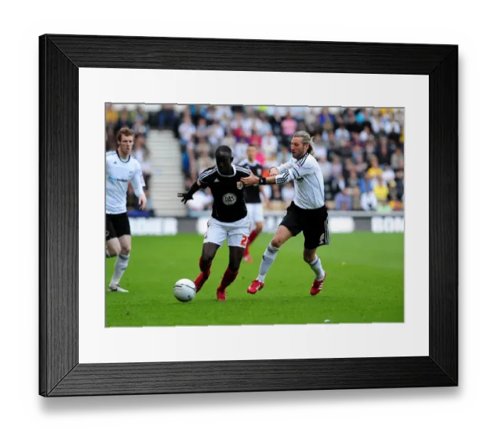Framed Print : Adomah vs Savage: Championship Battle at Pride Park - Derby County vs Bristol City (30 / 04 / 2011) Framed Print : Adomah vs Savage: Championship Battle at Pride Park - Derby County vs Bristol City (30 / 04 / 2011)