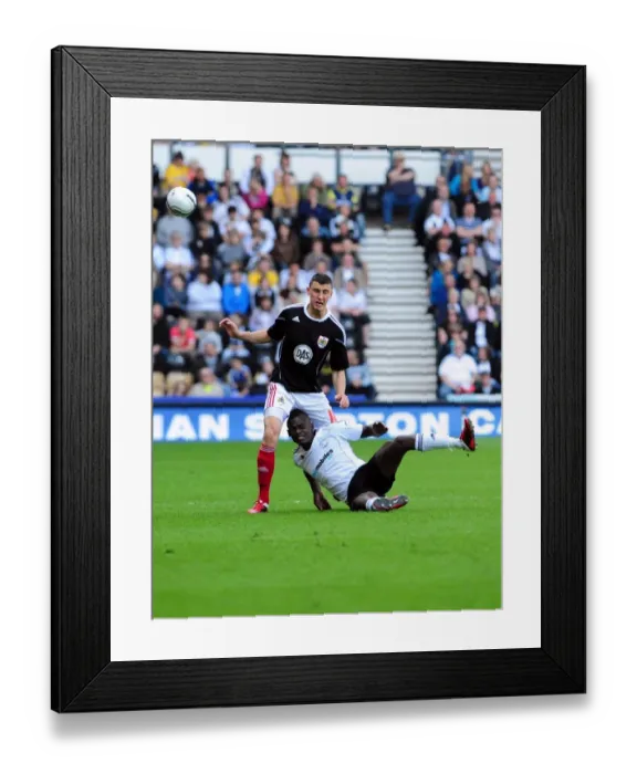 Framed Print : Battling for Championship Glory: Wilson vs. Robinson - Derby County vs. Bristol City, April 2011 Framed Print : Battling for Championship Glory: Wilson vs. Robinson - Derby County vs. Bristol City, April 2011