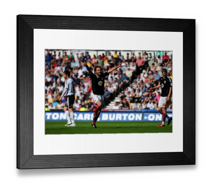 Framed Print : Cole Skuse's Double Strike: Bristol City Claims Championship Victory over Derby County (30th April 2011)