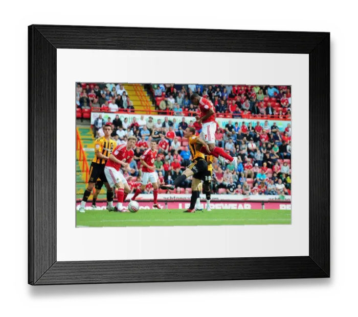 Framed Print : Defiant Moment: Marvin Elliott's Near-Miss Header for Bristol City against Hull City, Championship 2011