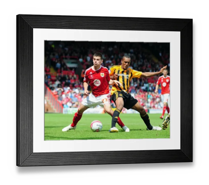 Framed Print : Bristol City's Joe Edwards Makes Full Debut: A Battle for the Ball vs. Hull City (07 / 05 / 2011, Championship) Framed Print : Bristol City's Joe Edwards Makes Full Debut: A Battle for the Ball vs. Hull City (07 / 05 / 2011, Championship)