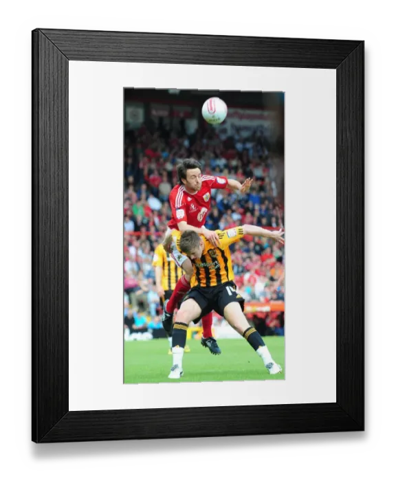 Framed Print : Cole Skuse Wins the High Ball: Bristol City vs. Hull City, Championship Match, May 7, 2011