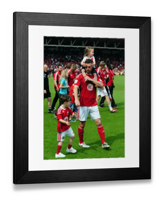 Framed Print : Bristol City's Jamie McAllister Celebrates Championship Victory with Family at Ashton Gate Stadium (07 / 05 / 2011) Framed Print : Bristol City's Jamie McAllister Celebrates Championship Victory with Family at Ashton Gate Stadium (07 / 05 / 2011)