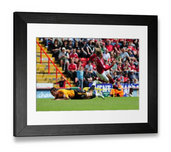 Framed Print : Bristol City's Martyn Woolford Fouled by Hull's Jack Hobbs during Championship Match, May 2011 Framed Print : Bristol City's Martyn Woolford Fouled by Hull's Jack Hobbs during Championship Match, May 2011