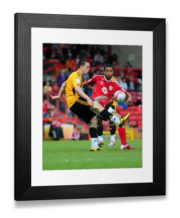 Framed Print : Bristol City vs Hull City: Lewin Nyatanga's Battle for the Ball - Championship Match, May 2011 Framed Print : Bristol City vs Hull City: Lewin Nyatanga's Battle for the Ball - Championship Match, May 2011