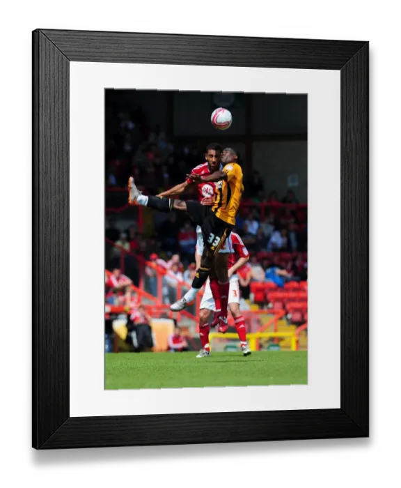 Framed Print : Battling for Supremacy: Nyatanga vs. McLean in the Championship Clash between Bristol City and Hull City (07 / 05 / 2011)