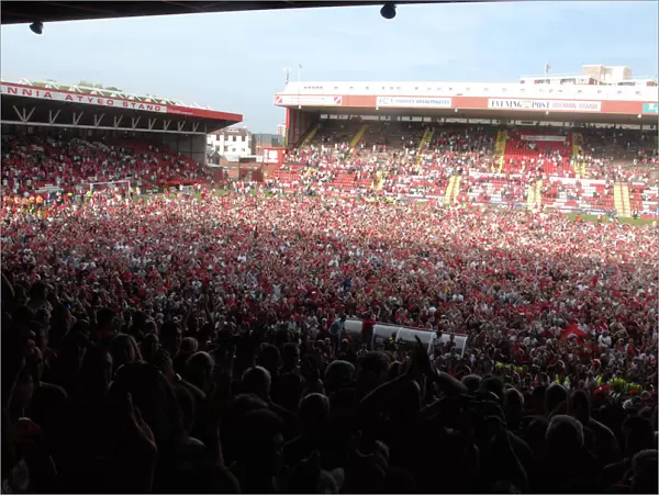 Bristol City Football Club: Unforgettable Moment of Promotion - Thrilled Fans Invade the Pitch