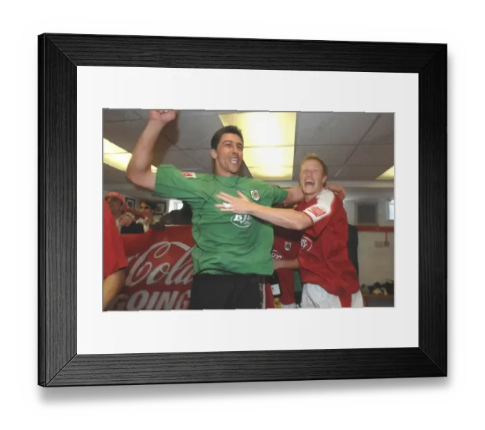 Framed Print : Basso's Thrilling Moment: Celebrating Promotion with Bristol City FC Framed Print : Basso's Thrilling Moment: Celebrating Promotion with Bristol City FC
